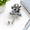 Silver-008, variant on Smile And The World Smiles With You Retractable Glitter Badge Reels