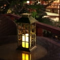 thumbnail image 2 of Lámpara solar de viento de plástico artesanal, lámpara de palacio hueca, decoración navideña para jardín al aire libre, lámpara de llama LED, lámpara colgante con forma de vela, 2 of 6