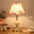 thumbnail image 3 of Lámpara de escritorio de cristal Simple de estilo europeo, lámparas de noche para dormitorio de tela Retro, luz de mesa de hierro forjado clásica, iluminación nocturna de lujo, 3 of 5