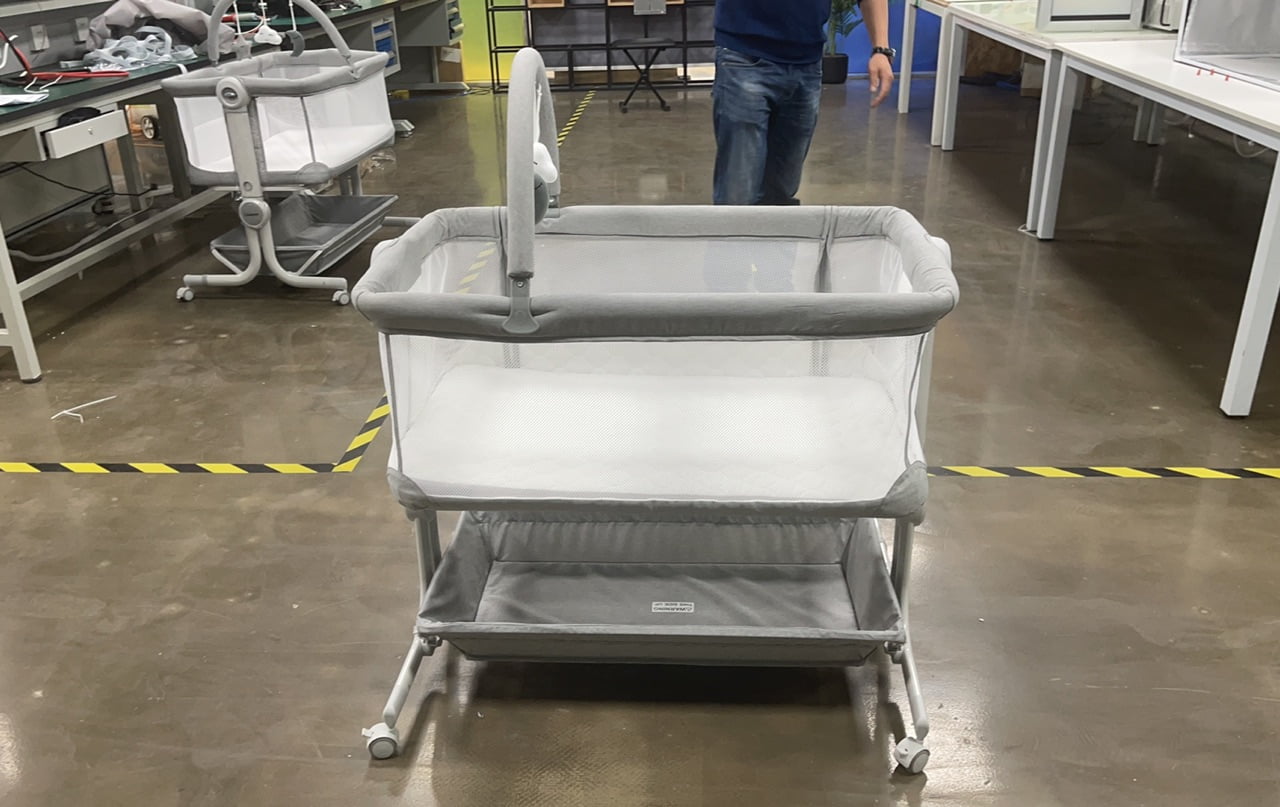 Cowiewie Baby Bedside Crib with Storage Basket, Wheels and