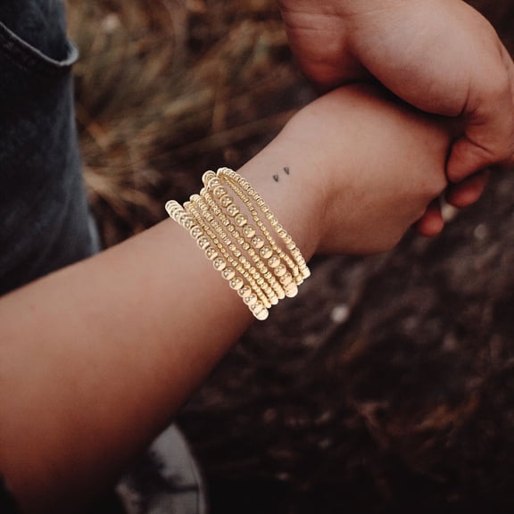 TEHAUX 7-Piece Brass Bangles Set for Women, Elegant Stretchy Beaded Bracelets, Stylish Tone Accessories