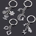 thumbnail image 2 of Llaveros de corazón de amor para mujer, hombre, perro, gato, llavero de coche, ala, mal de ojo, pistola, joyería de moda, colgante, amigo, regalos de boda originales, 2 of 4