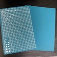 thumbnail image 3 of Tapete de corte A5 de PVC, tabla de cortar, banco de trabajo, costura Manual de retales, cuchillo DIY, grabado de cuero, base de un solo lado, 1 Uds., 3 of 4