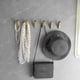 thumbnail image 3 of Juego de 4 ganchos de pared en oro cepillado para servilletas y albornoces., 3 of 5