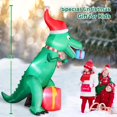 thumbnail image 2 of Dinosaurio inflable navideño FunFanso de 7 pies con luces LED, 2 of 7
