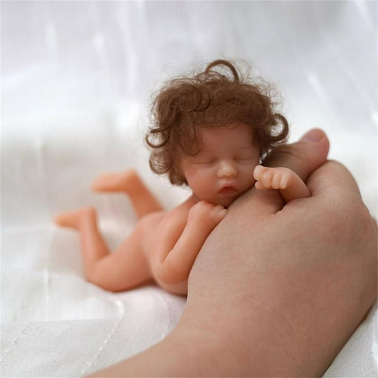 Tiny realistic best sale baby dolls