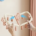 thumbnail image 4 of Foldable Clothes Drying Rack with Clips, Multi-Purpose Pants and Sock Hanger, Space-Saving, Windproof Clips, Durable Plastic, Indoor and Outdoor Laundry, Closet, Balcony Organizer, 4 of 5