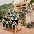 thumbnail image 4 of POWKOL Wrought Iron Plant Stand with 4 Wheels, 4 Layers Movable Flower Display Rack with 16 Buckets, Heavy Duty Florist Bouquet Shelf for Patio, Garden, Fresh Flower Shop.(Black Square Buckets), 4 of 7