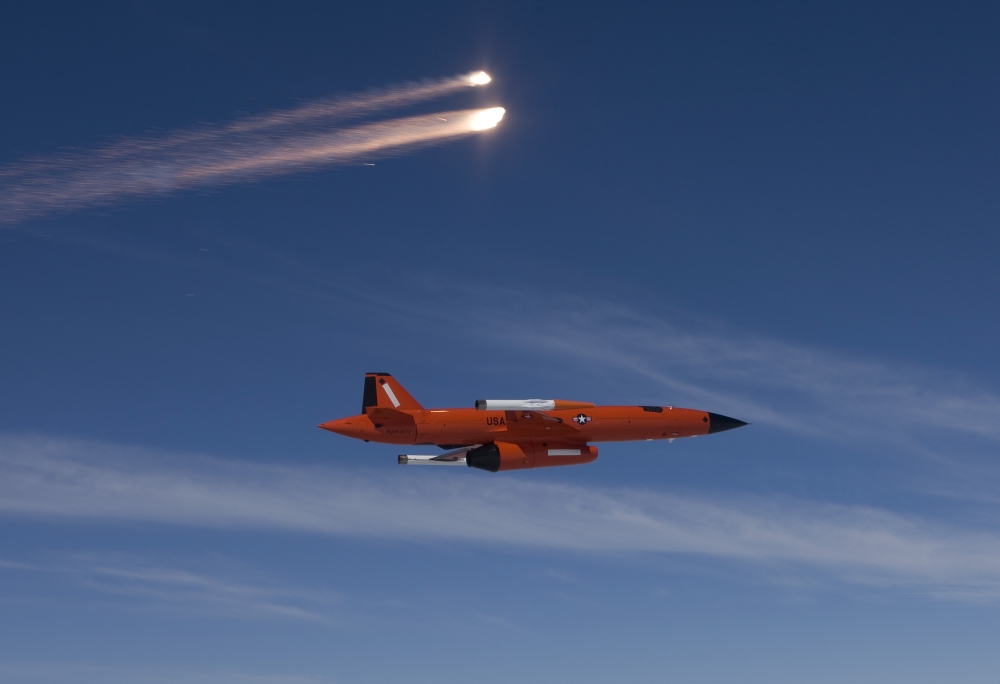 A BQM74 target drone fires flares during Weapons System Evaluation