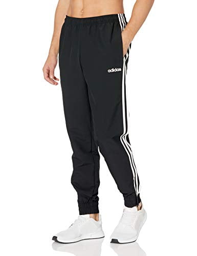 white adidas joggers with black stripes