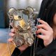 thumbnail image 2 of Estuche para iPhone 13 YONGSHENG Estuche de dibujos animados 3D Oso de Peluche Dorado con Correa de cadena de metal colgante de campana, 2 of 5