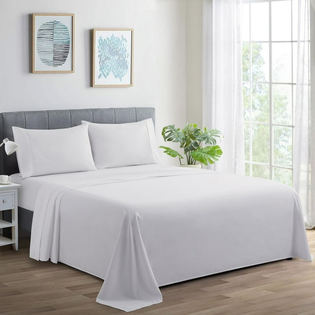 Ultra soft white 600 thread count percale cotton sheet set with deep pockets on a bed in a modern bedroom.