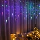 thumbnail image 4 of Cortina de luces LED con forma de carámbano - 96/216 luces navideñas LED con 8 modos de iluminación | Guirnalda de luces impermeable de 3,5 m/5 m para interior y exterior, ideal para decoración, 4 of 6