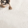 thumbnail image 6 of SAFAVIEH Revive Montana Abstract Polyester Area Rug, Ivory, 6'7" x 6'7" Round, 6 of 7