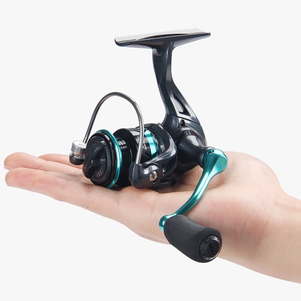 Rueda giratoria de metal negro, rueda de pesca, rueda de carretera, rueda de micro-pesca, rueda de caña marina, rueda de objetos grandes