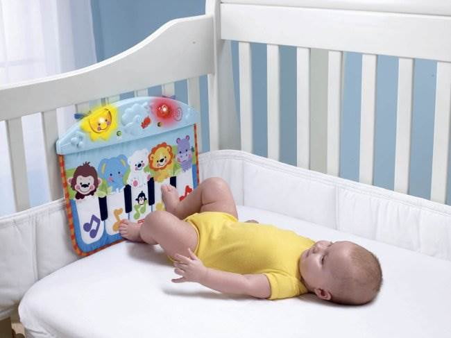 fisher price kick and play crib piano
