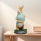 thumbnail image 5 of Manualidades de Pascua: conejo de resina, conejo abrazando una zanahoria, figurita de Pascua, estatuilla de conejo bonito para decorar el hogar, el escritorio o el jardín, 5 of 6