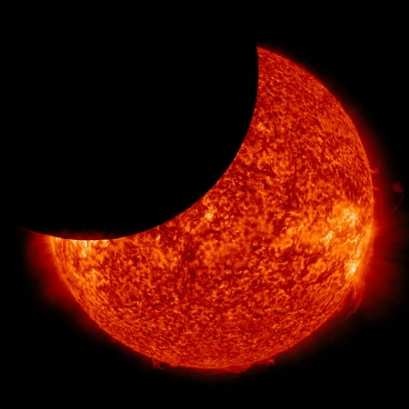 January 30 2014 - The moon is seen moving between NASAs Solar Dynamics Observatory and the Sun giving the observatory a view of a partial solar eclipse from space Poster
