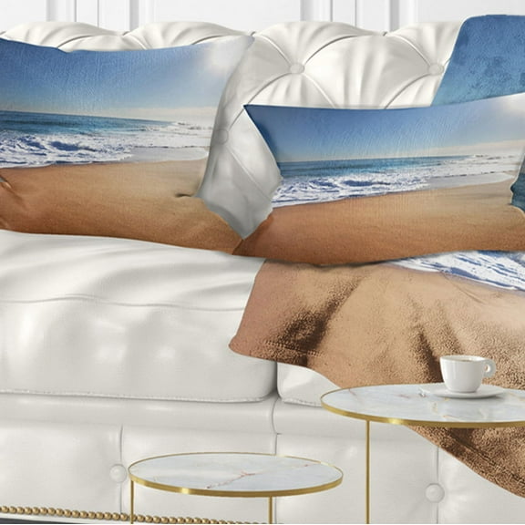 Designart Calm Blue Seashore with White Sun - Seashore Throw Pillow - 12x20