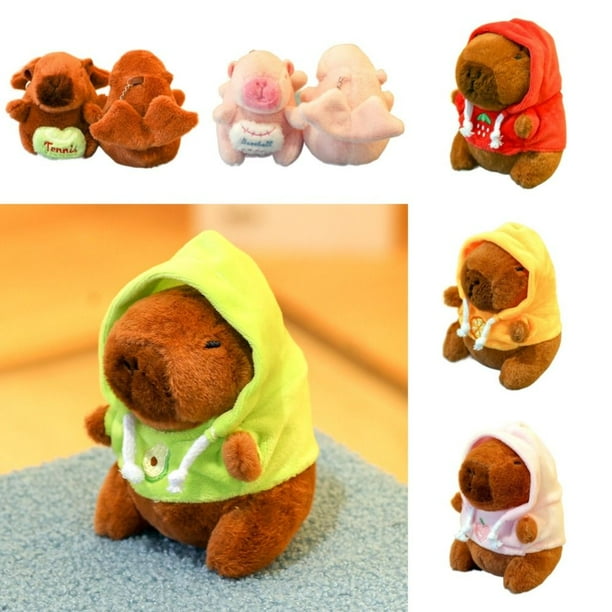 Peluche De Capibara De 25 Cm Con Accesorios – Muñeco De Felpa Suave Con Gorro De Conejito, 4 Telas Y 2 Bolsas, Juguete Coleccionable Para Niños Y Adultos