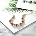 thumbnail image 4 of Gem Stone King 18K Yellow Gold Plated Silver Red Garnet Tennis Bracelet for Women (7.14 Cttw, Gemstone Birthstone, Oval 7X5MM, 7 inch with 1 inch Extender), 4 of 4