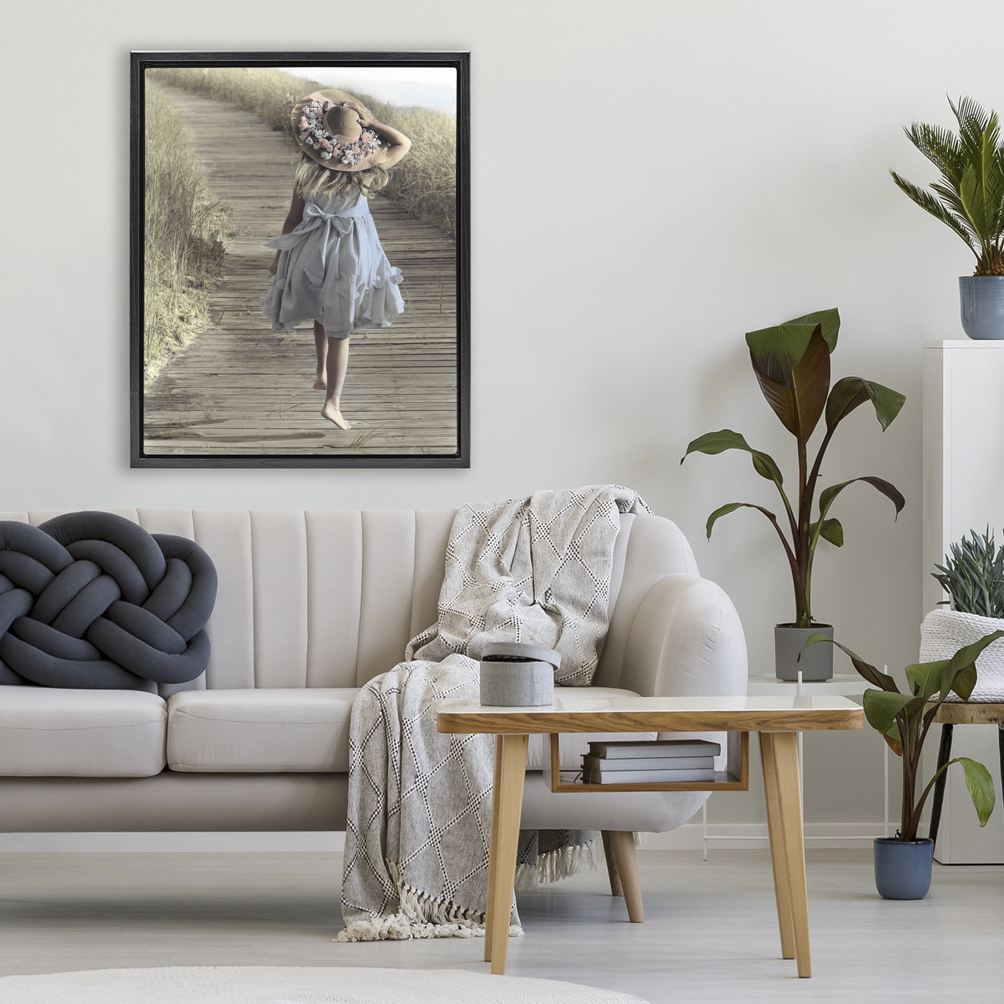 Stupell Industries Girl With Sun Hat Walking Black Framed Floater Canvas Wall Art, design by Kendra Dew