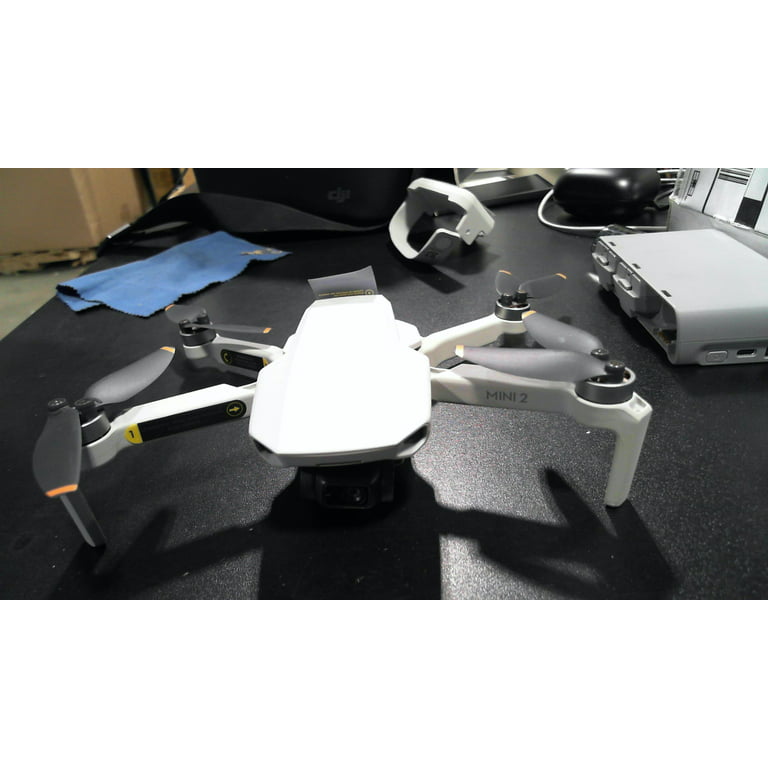  DJI Mini 2 Fly More Combo – Ultralight Foldable Drone, 3-Axis  Gimbal with 4K Camera, 12MP Photos, 31 Mins Flight Time, OcuSync 2.0 10km  HD Video Transmission, QuickShots, Gray : Electronics
