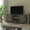Gray, variant on BizChair Modern Farmhouse Barn Door TV Stand - Gray Wash Oak for TV's up to 65 Inches - 59" Entertainment Center with Adjustable Shelf