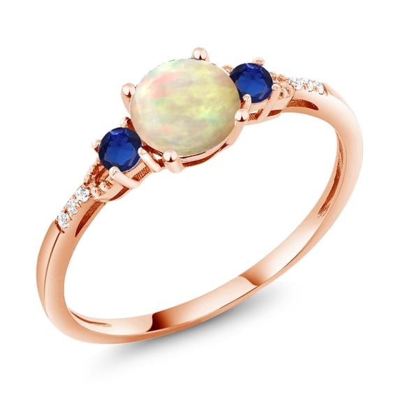 Gem Stone King 10K Rose Gold White Ethiopian Opal Blue Created Sapphire and White Diamond Accent 3-Stone Engagement Ring for Women (0.70 Cttw, Round Cabochon 6MM, Gemstone October Birthstone, Size 7)