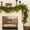 Norfolk Pine, variant on Guvpev 6FT Christmas Garland with String Lights, Real Touch Winter Norfolk Pine Garland, Green Artificial Cryptomeria Greenery Garland for Mantel, Table, Porch, Indoor, Outdoor Christmas Decorations