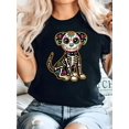 thumbnail image 1 of Halloween T-shirt - Day of the Dead Puppy Skeleton Graphic Tee for Girl - Vibrant Black Casual T-Shirt with Colorful Skull & Flower Design, Fashion | Playful Graphic Tee | Stretchy Fabric Shirt, 1 of 6
