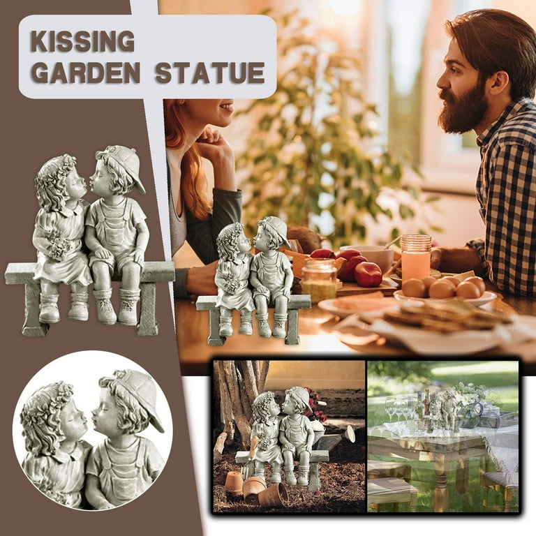 Garden statues boy and girl kissing on bench