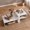White, variant on Costway 2-Tier Coffee Table with Open Storage Shelf, Cross-shaped Base for Living Room Rustic Brown