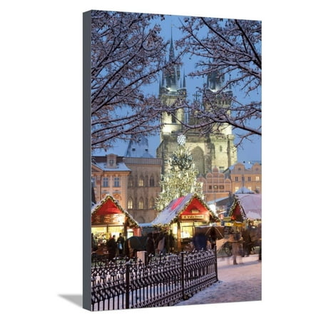 Snow-Covered Christmas Market and Tyn Church, Old Town Square, Prague, Czech Republic, Europe Stretched Canvas Print Wall Art By Richard