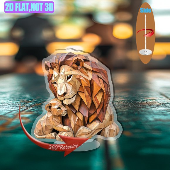 Rotating acrylic display featuring intricately carved male lion and cub in vivid colors showcasing natural wood grain and detailed expressions