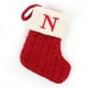 thumbnail image 1 of Medias navideñas personalizadas con letras del alfabeto: calcetines de dulces festivos con lazo para colgar, ideales para decorar el árbol y regalar en las fiestas., 1 of 2