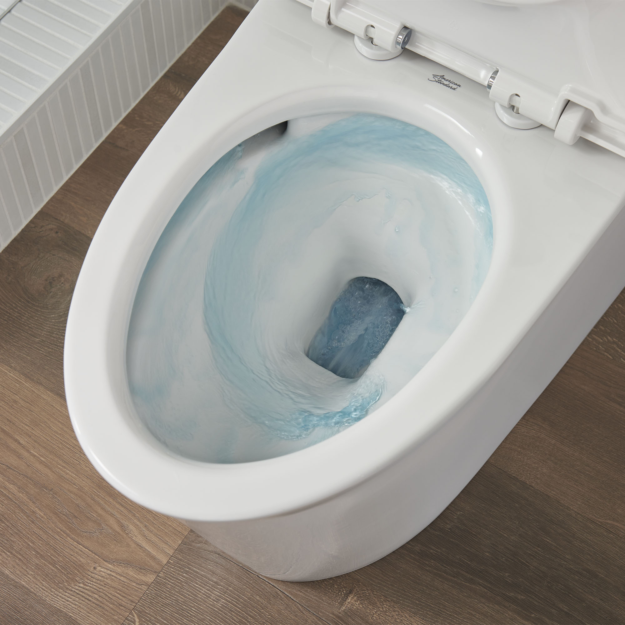 American Standard Studio S 1-piece 1.0 GPF White Elongated Low-Profile Toilet, Seat Included - image 8 of 14
