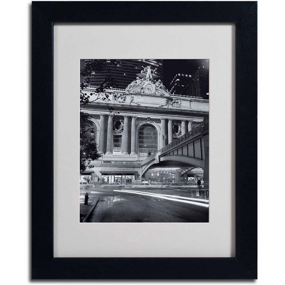 Matted art under acrylic in a black frame