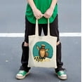 thumbnail image 4 of Cute Cartoon Owl Sailor Tote Bag - Multifunctional Canvas Bag for Shopping Travel & Parties - Teal Background with ' Hayane ' in Yellow Cursive, 4 of 6