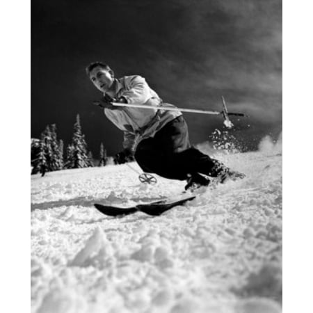 Low angle view of a young man skiing downhill Canvas Art - (18 x 24)