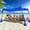 Indigo, variant on Rhino Valley Beach Tent Sun Shelter, Beach Canopy Tent Sun Shade UPF50+ Protection with 8 Sandbags 4 Stability Poles, Outdoor Beach Shade Canopy for Beach, Camping, Fishing
