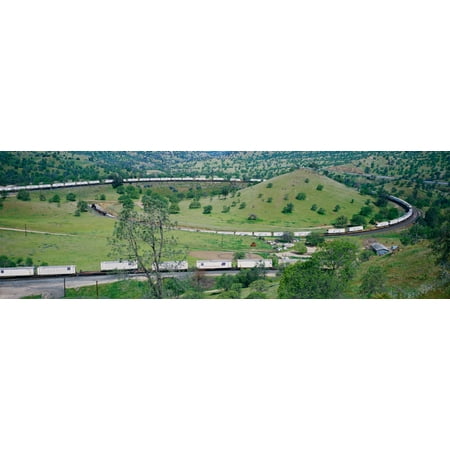 The Tehachapi Train Loop near Tehachapi California is the historic location of the Southern Pacific Railroad where freight trains gain 77 feet in elevation and show freight cars traveling in giant (Best Wedding Locations In California)