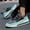 Dark Green color, variant on Mens shoes - Men's full-length air-cushioned running shoes, with white, black and orange color combination, breathable and ultra-light design, suitable for casual sports, daily outings