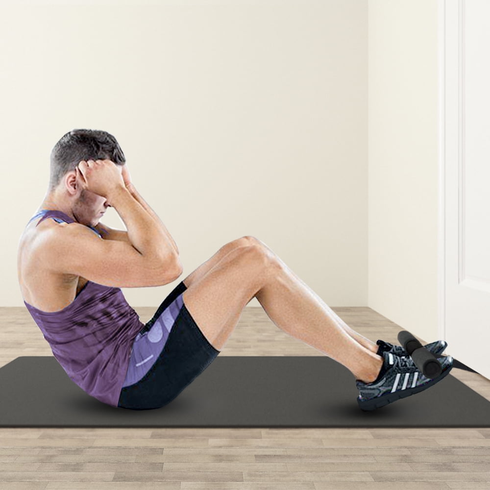 Doing crunches and sit-ups using foot straps for control on the Portable  ABMat has never being easier.