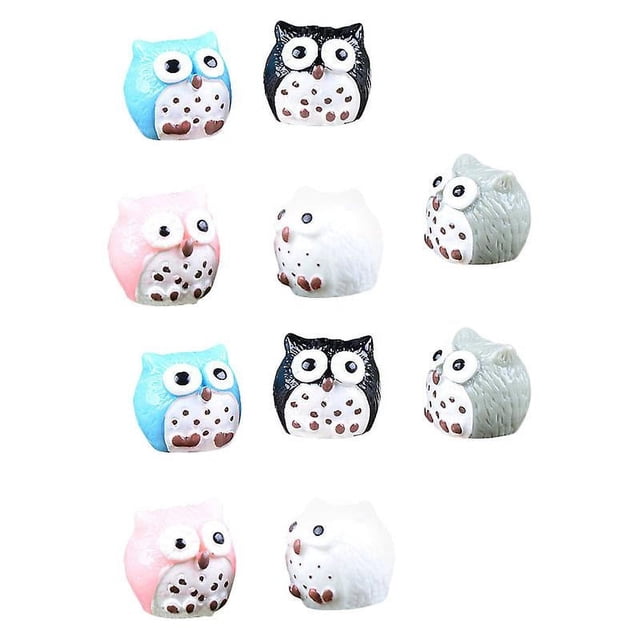 12 mini búhos de resina.