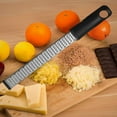 thumbnail image 4 of Lemon Classic Zester Grater with Handle, Kitchen Tool for Zesting Citrus Fruits & Finely Grating Parmesan Cheese, Garlic, Ginger, Coconut, Nutmeg, Wasabi, Chocolate etc, Stainless Steel, 4 of 6