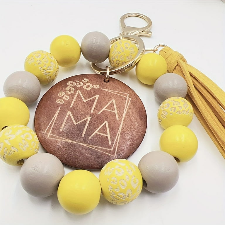METAL BEAD BRACELET W/TASSEL YELLOW METAL BEAD BRACELET W/TASSEL YELLOW