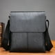 thumbnail image 1 of Bolso Bandolera de Piel Sintética Texturizada, con Correa Ajustable, Ligero y Espacioso, Ideal para Viajes, Trabajo y Uso Diario | Múltiples Compartimentos para Organizar Tu Espacio | Negro y Marrón, 1 of 6
