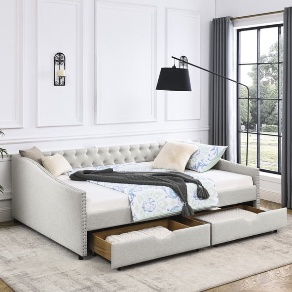 Upholstered queen size daybed with storage for a comfortable living room experience