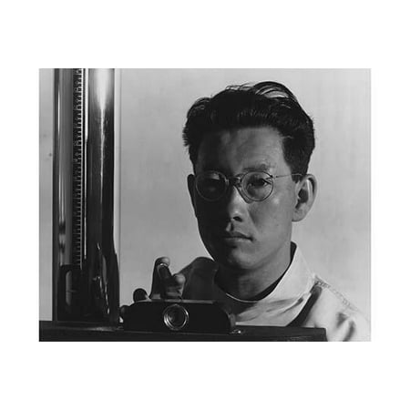 Michael Yonemitsu bust portrait facing front behind x-ray equipment  Ansel Easton Adams was an American photographer best known for his black-and-white photographs of the American West  During part